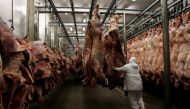A worker arranges slaughtered cattle in the freezing room in the Marfrig Group slaughter house in Promissao, 500 km northwest of Sao Paulo, October 7, 2011 (REUTERS / Paulo Whitaker) 