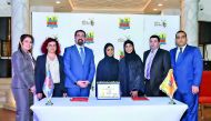 KidzMondo Doha and Mini Pancake officials at the partnership signing ceremony.