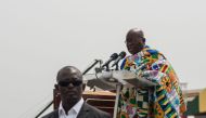 The winner of Ghana's presidential election, Nana Akufo-Addo, takes the oath of office during the swearing-in ceremony at Independence Square in Accra, on January 7, 2017 (AFP Photo/Cristina Aldehuela).