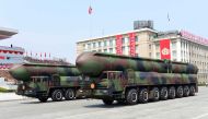This April 15, 2017 picture released from North Korea's official Korean Central News Agency (KCNA) on April 16, 2017 shows Korean People's ballistic missiles being displayed through Kim Il-Sung square during a military parade in Pyongyang marking the 105t