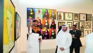 Sudanese artist Islam Kamel and Katara General Manager Dr Khalid bin Ibrahim Al Sulaiti at the launch of ‘Language of Silence’ at Katara Art Centre.