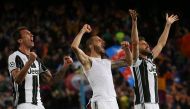 Juventus' Mario Mandzukic, Leonardo Bonucci and Andrea Barzagli celebrate after the match Reuters / Sergio Perez 
