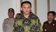 Jakarta's Governor Basuki Tjahaja Purname, also known as Ahok, arrives for his court hearing in Jakarta on April 20, 2017. AFP / POOL / Tatan Syuflana