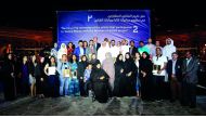 Artists and Katara officials at the honouring ceremony for second edition of ‘Katara Murals with the Brushes of Artists’ project, at Katara. 
