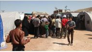 Chemical gas attack survivors are placed in a camp at Turkish border in Idlib, Syria on April 6, 2017. ( Abdüssamed Dagül - Anadolu Agency ).