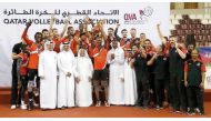 Al Rayyan players and officials celebrate their win over Al Arabi in the final match of the Emir Cup volleyball at Qatar's Women's Sports Committee Hall during the presentation ceremony at Aspire Dome yesterday. 