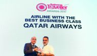 Qatar Airways Country Manager - UAE, Rohan Seneviratne, receiving the award from celebrity chef Vineet Bhatia.