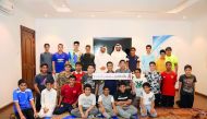Officials and children at the awareness lecture. 