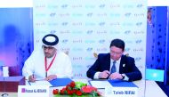 Hassan Al Ibrahim, Chief Tourism Development Officer at QTA, and Taleb Al Rifai, Secretary-General of UNWTO, signing the agreement.