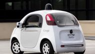 FILE PHOTO - Journalists take a test drive in a prototype of Google's own self-driving vehicle during a media preview of Google's current autonomous vehicles in Mountain View, California September 29, 2015. REUTERS/Elijah Nouvelage