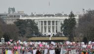 (FILES) Demonstrators protest near the White House in Washington, DC, for the Women's March on January 21, 2017. AFP / Andrew Caballero-Reynolds 
