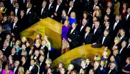 Hundreds of people pose for a picture with Queen Maxima and King Willem-Alexander (centre) after a dinner with 150 fifty-year-old Dutch people who were invited on the occasion of the 50th birthday of the King at the Royal Palace in Amsterdam, late on Frid