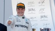 Mercedes Formula One driver Valtteri Bottas of Finland celebrates the victory after the race. REUTERS/Maxim Shemetov