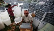 Men unload ballot boxes for the upcoming local election of municipalities and villages representatives at the election commission in Kathmandu, Nepal April 23, 2017. REUTERS/Navesh Chitrakar/Files.