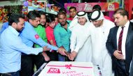  Ramez Group General Manager, Basheer Sayeed with other officials and employees cut a cake to celebrate the International Labour Day at Aswaq Ramez, Abu Hamour.  Pic: Kammutty VP / The Peninsula