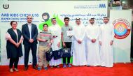 Winners of the AAB Kids  U16 Chess Tournament, pose with the guests.
