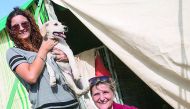 De Boer volunteers with the pets Eggy and Rex.