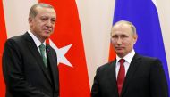 Russian President Vladimir Putin (R) shakes hands with his Turkish counterpart Tayyip Erdogan during a news conference following their talks in Sochi, Russia, May 3, 2017. REUTERS/Alexander Zemlianichenko/Pool
