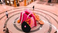 Bags and heels made of balloons by world-renowned artist Larry Moss and his team of 11 international artists, at the Doha Festival City.
