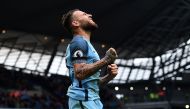 Manchester City's Argentinian defender Nicolas Otamendi celebrates scoring his team's fifth goal during the English Premier League football match between Manchester City and Crystal Palace at the Etihad Stadium in Manchester, north west England, on May 6,