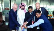IndiGo and Hamad International Airport officials cut a cake at HIA to celebrate the arrival of the first flight by the Indian carrier to Doha