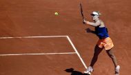 Angelique Kerber of Germany returns the ball during her match against  Katerina Siniakova of the Czech Republic at the Madrid Open in  Madrid, Spain.