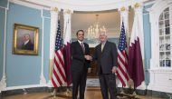US Secretary of State Rex Tillerson and Qatari Foreign Minister Mohammed bin Abdulrahman al-Thani shake hands prior to a meeting at the State Department in Washington, DC, May 8, 2017. (AFP / SAUL LOEB)