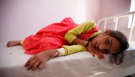 FILE PHOTO: A girl lies on a bed at a hospital where she is receiving treatment for cholera in Sanaa, Yemen, October 11, 2016 (REUTERS / Khaled Abdull) 