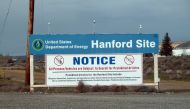 This file photo taken on March 17, 2011 shows a sign warning visitors of searches for prohibited materials as they near the Hanford nuclear site in Hanford, Washington. AFP / Shaun Tandon