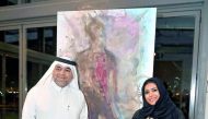 Qatari contemporary artist Ebtisam Al Saffar (right) and Khalifa Al Obaidli, Director of the Fire Station, at the opening of the exhibition. Pic: Baher Amin / The Peninsula