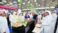 Minister of Commerce and Economy H E Sheikh Ahmed bin Jassim Al Thani and Minister of Energy and Industry H E Dr Mohammed bin Saleh Al Sada at the Ashghal booth in the presence of Eng Abdullah bin Hamad Al Attiyah, Assistant President of the Public Works 