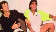 Legendary Pakistani cricketer Imran Khan and team-mate Aqib Javed share a light moment in this file photo.