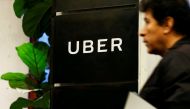 FILE PHOTO: A man exits the Uber offices in Queens, New York, U.S., February 2, 2017. REUTERS/Brendan McDermid/File Photo
