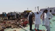 A wall crashed down on an Indian wedding party during a storm killing at least 24 people including four children, police said, with one rescuer describing the scene as 