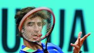 Pablo Cuevas of Uruguay returns the ball to Alexander Zverev of Germany during the ATP Madrid Open quarter-final match in Madrid, yesterday. Cuevas won 3-6, 6-0 and 6-4.