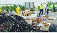 Authorities during a raid at an unauthorised market in Al Shahaniya Municipality.