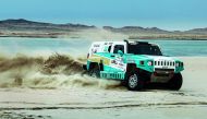 Yuriy Sazonov of Kazakhstan in action in his Hummer in this file picture.