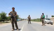 Afghan National Army (ANA) soldiers stand guard during a battle with Taliban in Kunduz provice, Afghanistan May 10, 2017. REUTERS/Nasir Wakif.