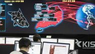 A photo taken on May 15, 2017 shows staff monitoring the spread of ransom-ware cyber-attacks at the Korea Internet and Security Agency (KISA) in Seoul. / AFP / YONHAP / YONHAP / REPUBLIC OF KOREA OUT.