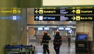 Firemen inspect Changi International Airport terminal 2 in Singapore on May 16, 2017. Hundreds of passengers were evacuated from Singapore's Changi Airport on May 16 after a small fire erupted in a terminal that was quickly extinguished, authorities and w