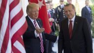 US President Donald Trump welcomes Turkish President Recep Tayyip Erdogan as he arrives for meetings at the White House in Washington, DC, May 16, 2017. / AFP / SAUL LOEB
