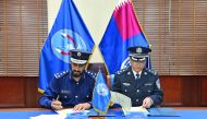 Director General of the Police College, Brigadier Dr Mohammad Abdullah Al Mohanna, and Director of Police College of Fujian, Lauroy Rong, signing the agreement.