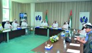 Customs officials from Qatar interacting with Dubai Customs officials. 