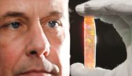 South Australian Museum Director Brian Oldman with the A$1m Virgin Rainbow opal — one of the highlights of the exhibition.