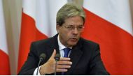 Italian Prime Minister Paolo Gentiloni will have talks with newly-elected French President Emmanuel Macron in Paris on Sunday before hosting the G7 summit in Sicily (AFP Photo/Yuri KADOBNOV).