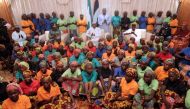 A group of Chibok girls, who were held captive for three years by the millitant group Boko Haram, in Abuja, Nigeria, May 7, 2017.  Bayo Omoboriowo—Presidential Office Handout Handout/Reuters.—REUTERS.