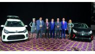 Mohamed Maali (third left), CEO of Al Attiya Motors and Trading Company (AMTC), and Isam El Bashier (second left), CRM Manager, along with other officials during the launch of the all-new Kia Picanto at La Cigale Hotel.  Pic: Kammutty VP/ The Peninsula