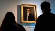 Visitors look at a painting of the Austrian musician Franz Xaver Mozart (son of Wolfgang Amadeus Mozart) at the Mozart Residence in Salzburg, as part of an exhibition organised by the Mozarteum Foundation, on March 09, 2016. / AFP / JOE KLAMAR