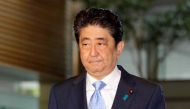 Japan's Prime Minister Shinzo Abe arrives at his official residence in Tokyo, Japan in this photo taken by Kyodo, May 14, 2017, after South Korea's military said that North Korean had fired an unidentified projectile from a region near its west coast.