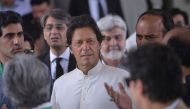 Pakistani opposition leader and head of the Pakistan Tehreek-i-Insaf (PTI) party Imran Khan leaves the Supreme Court after attending a hearing on the Panama Papers case in Islamabad on May 22, 2017. (AFP / AAMIR QURESHI)